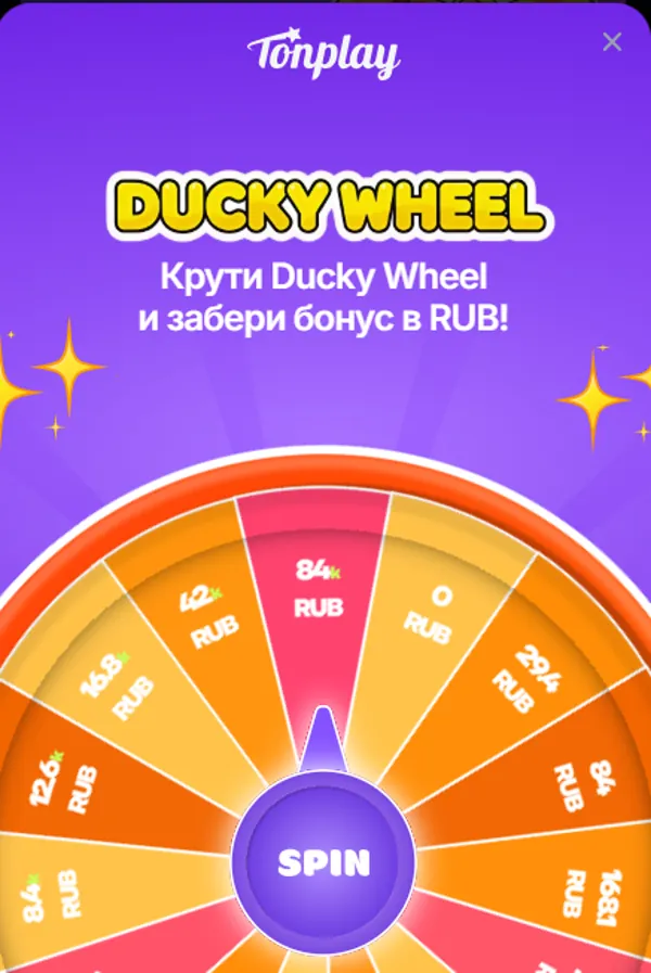 Колесо Ducky Wheel в TonPlay с предложением бонуса в рублях и кнопкой SPIN